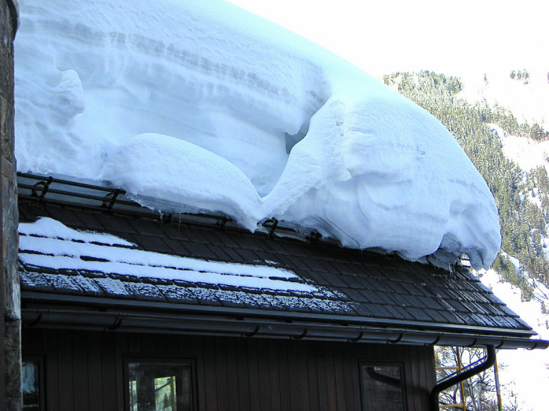 Snow barrier on roofs
